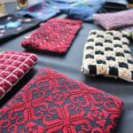 exhibition of handcrafted embroidery created by beneficiaries of the Ayadi project funded by AICS