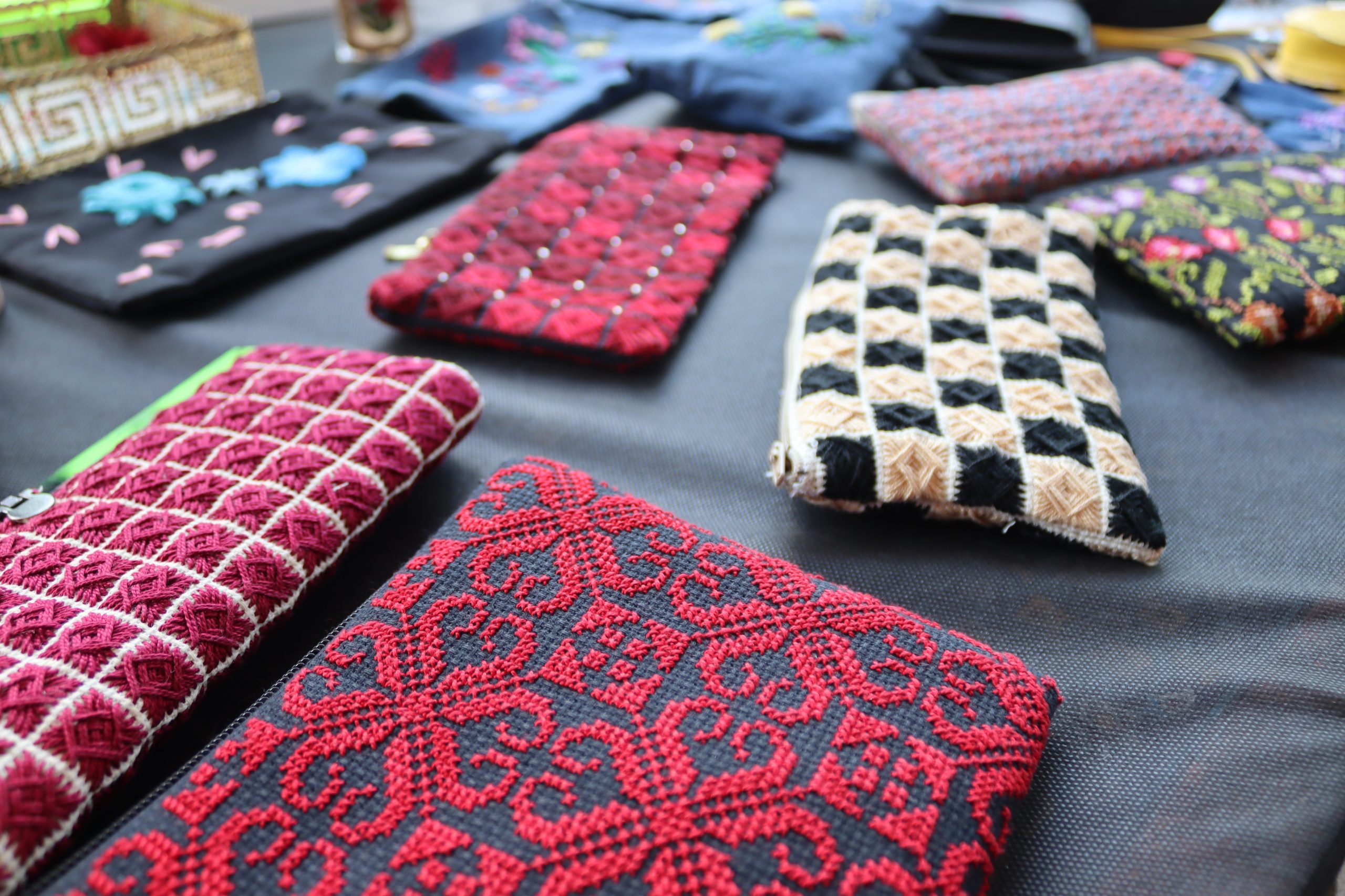 exhibition of handcrafted embroidery created by beneficiaries of the Ayadi project funded by AICS