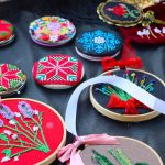 exhibition of handcrafted embroidery created by beneficiaries of the Ayadi project funded by AICS