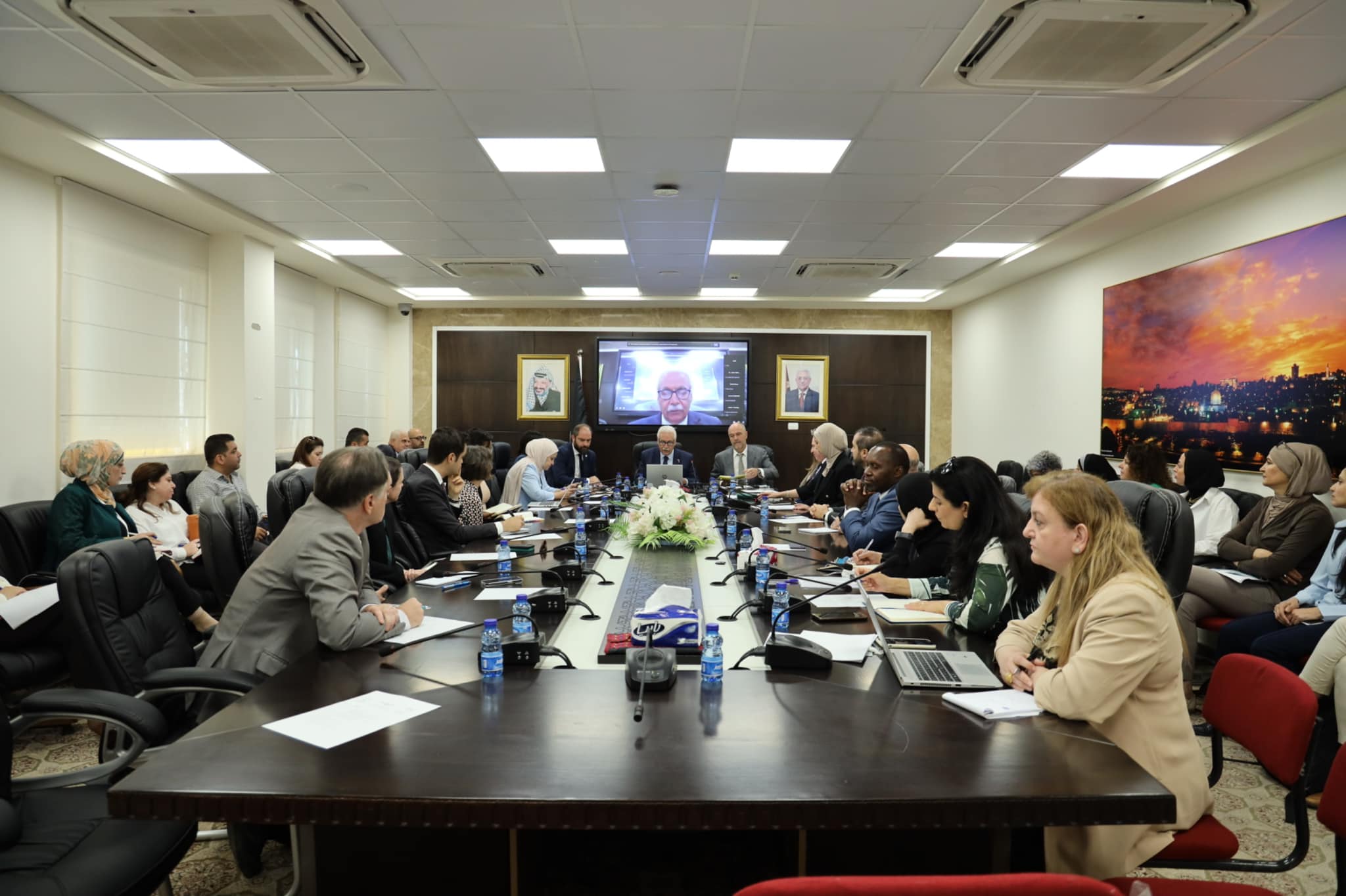 Mirko Tricoli from the Italian Agency for Development Cooperation and Dr. Rik Peeperkorn from WHO listening attentively to health sector updates.